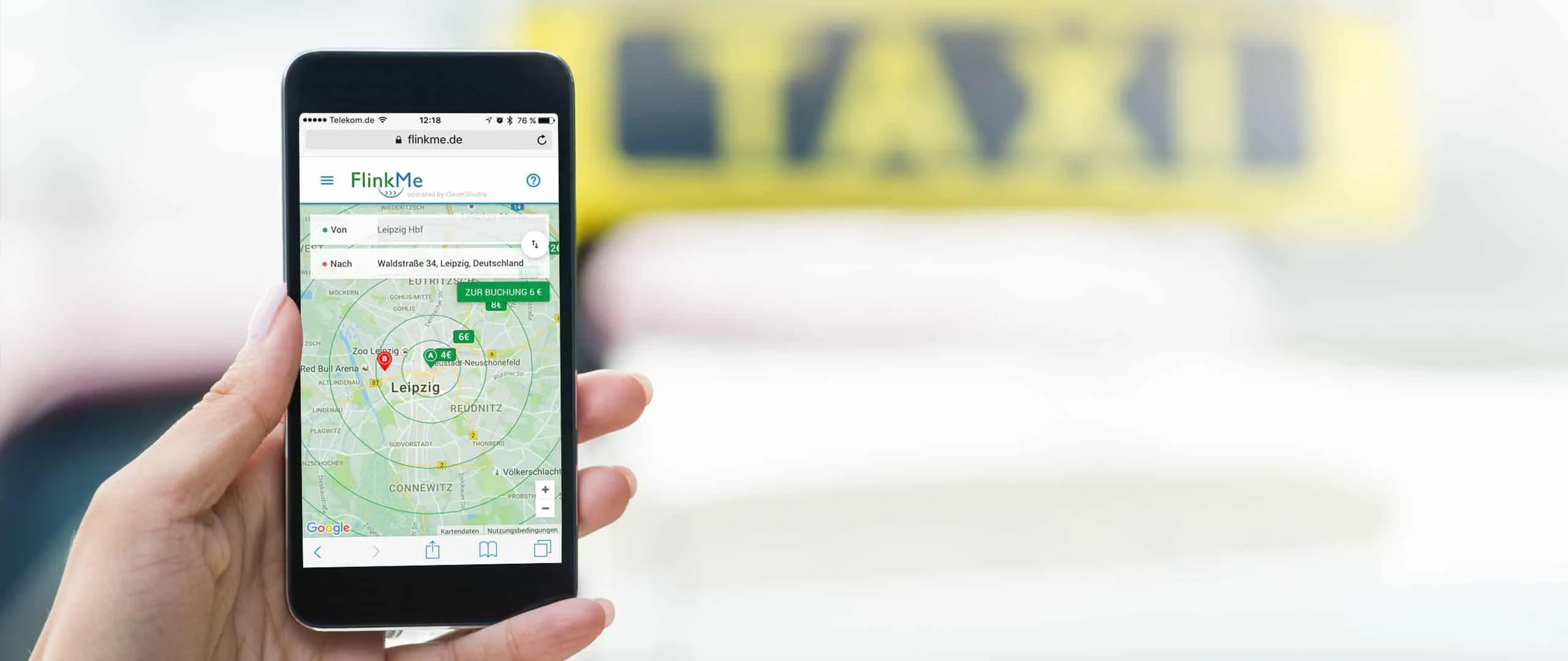 A hand holds a phone showing a FlinkMe booking from Leipzig Hbf to Waldstraße, with a taxi sign behind