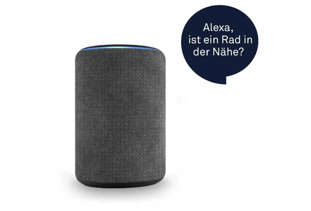 A smart speaker beside a speech bubble asking “Alexa, is there a bike nearby?”