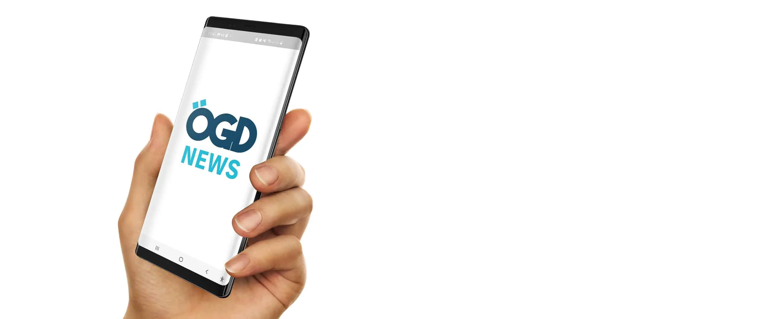 A hand holds a phone showing the ÖGD News logo on the start screen